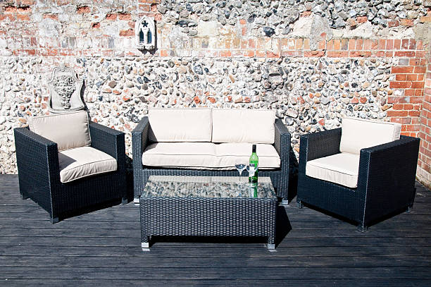 istock Alfresco dinning with black rattan furniture and table setting 184931786