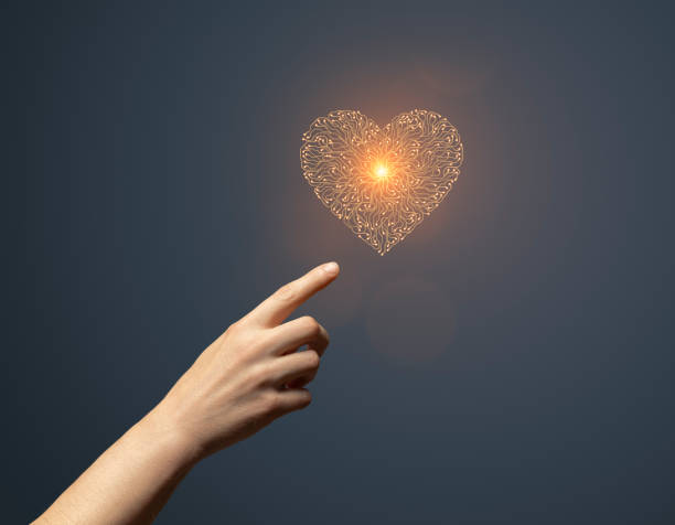 istock Artificial intelligence Circuit board heart symbol in hand touching it on dark 1849322202