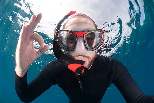 istock free diver gives the ok sign 184932327