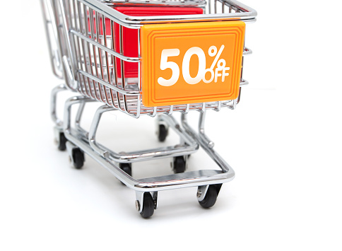 Shopping Sale - 50% Discount with Shopping Cart isolated on white