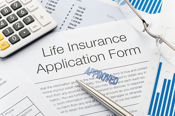 istock Close up of approved Life Insurance Application Form 184932776