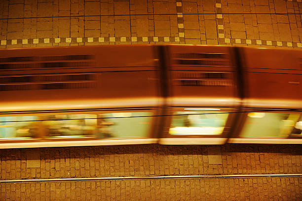 Train in motion from above ** Motion blur on moving train** Train ( a tram) in motion from above. Taken at night in Strasbourg City CentreMore like this blurred motion street car green stock pictures, royalty-free photos & images