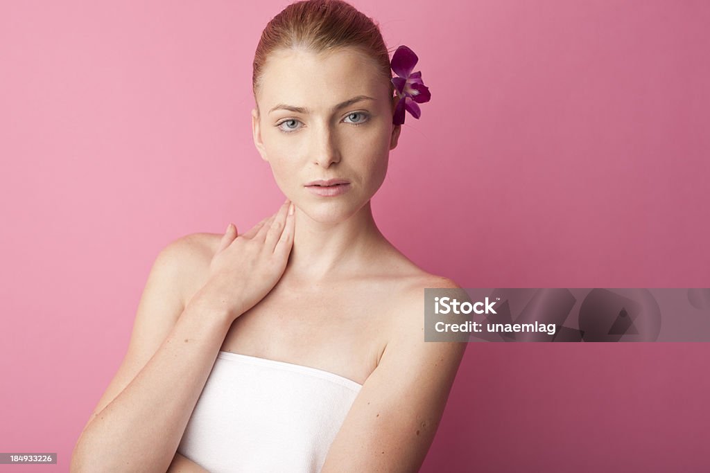 woman with lavender flower in her hair woman with lavender flower hair pin in her hair Adult Stock Photo