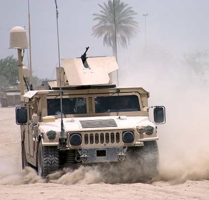 U.S. HMMWV kicking up dust in Iraq. 