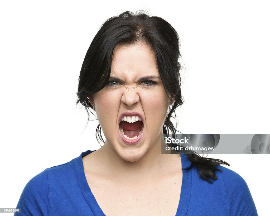 Screaming Young Woman Portrait of a young woman on a white background. 20-24 Years Stock Photo