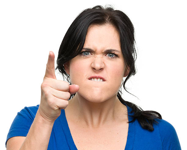 istock Angry Young Woman Shakes Finger 184933693