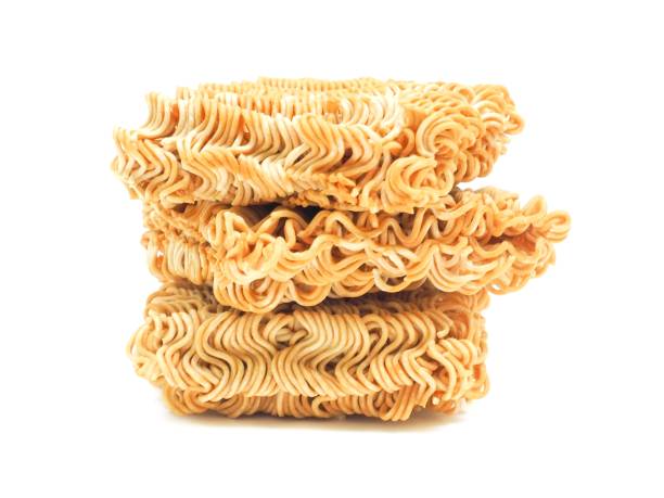 istock Blocks of dry instant noodles placed isolated on a white background. 1849338044