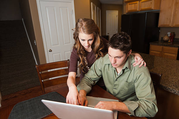 istock Couple paying online bills 184934857