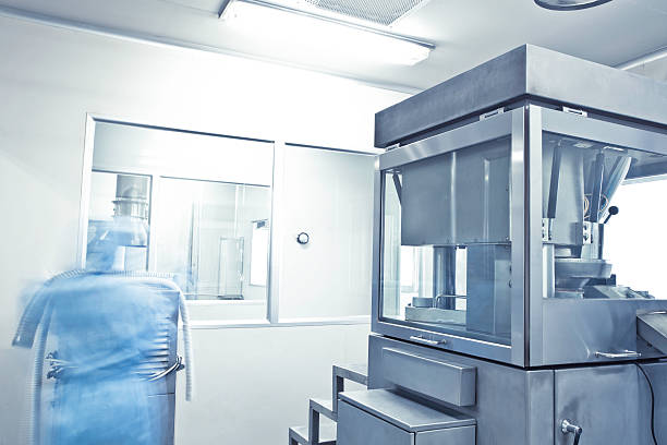 istock pharmaceutical factory equipment working 184934998