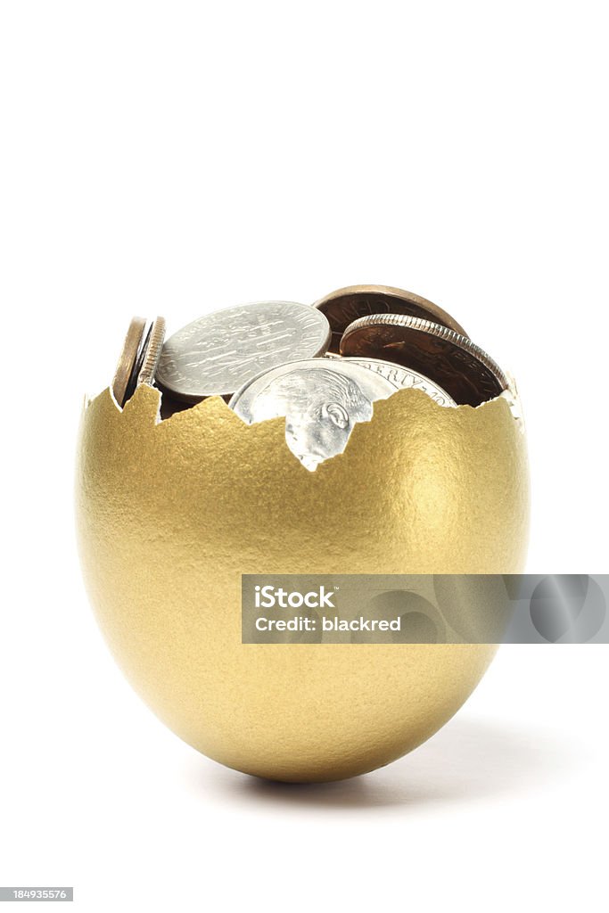 Money Came Out from a Golded Egg on White Background "Gold egg filled with coins, isolated on white background." Animal Egg Stock Photo