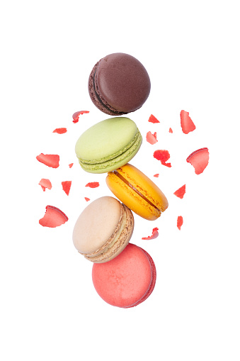 Sweet and colored macaroons on white background