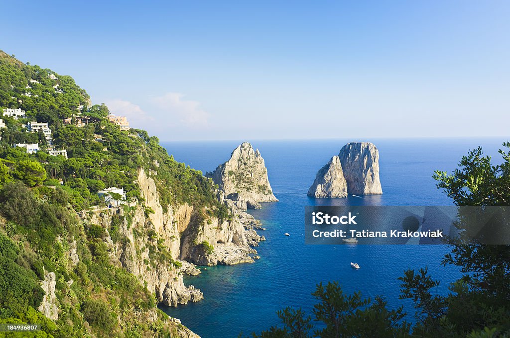 Capri Island Green Capri Island and Faraglioni rocks (Italy, Bay of Naples) Capri Stock Photo