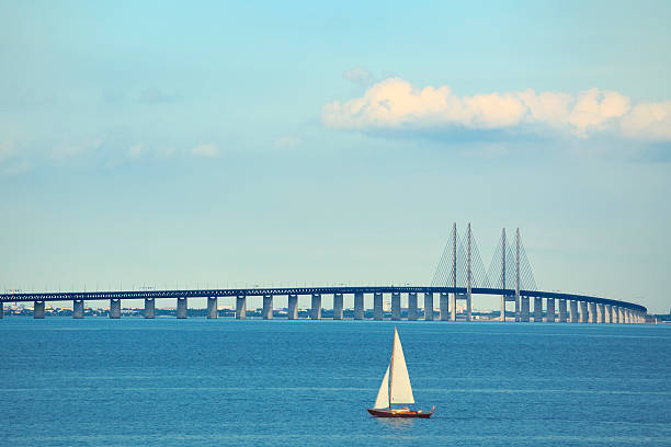 Öresund bridge "The 7.845 metres long aresund bridge between Copenhagen, Denmark and MalmA, Sweden. Seen from the danish side." oresund bridge stock pictures, royalty-free photos & images