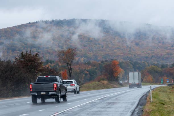 istock road in autumn 1849379402