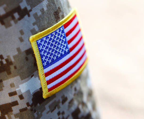 American Soldier Military soldier's american flag arm patch. us marine corps stock pictures, royalty-free photos & images