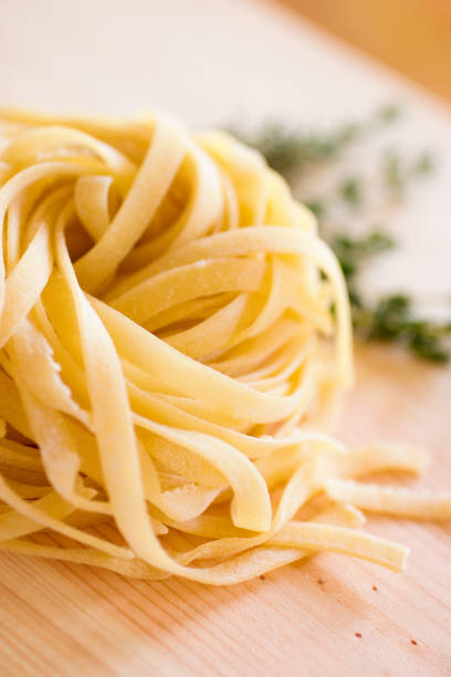 istock Close-up of rolled up fresh pasta 184938238