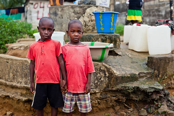 istock Two African Boys By Water Pump 184938513