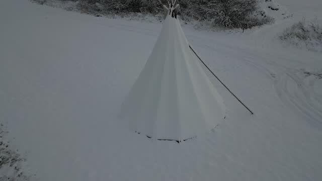 the teepee tent is equipped on the inside with furniture for groups of children in kindergarten. outdoor lessons combined with games in the meadow and drawing will not hurt