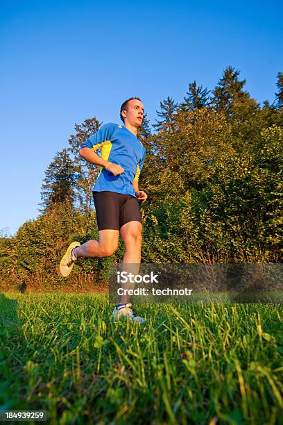 Jogging Action Stock Photo - Download Image Now - 20-24 Years, Active Lifestyle, Activity