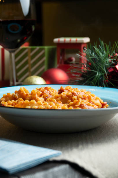 istock Pasta dish with tomato and ricotta with Christmas decorations 1849393085