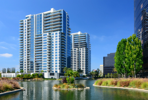 Condominium Towers, office buildings, and a lake in South Santa Ana in Orange County, CA