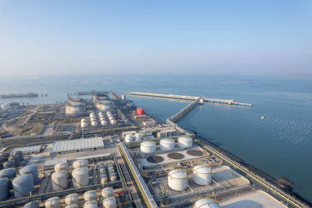 istock chemical plant operating by the seaside 1849401590