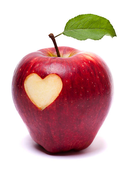 istock Red apple with heart symbol and leaf 184940209