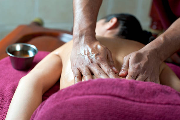 istock young woman is getting an ayureveda massage 184940297