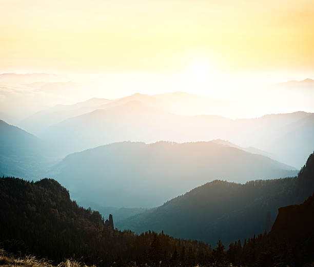 istock majestic sunset over mountain landscape 184940466
