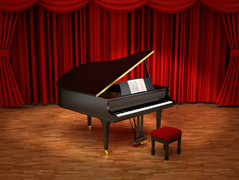 Grand piano illuminated with spotlights standing on the stage.Similar images:
