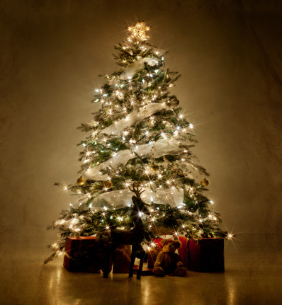 Christmas Hope - Advent Candle With Star Flame In Ball Hanging Tree With Defocused Bokeh Light - Prayer Concept