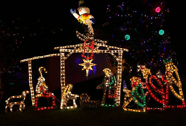 istock Christmas Light Nativity Scene With Snowman 184941141