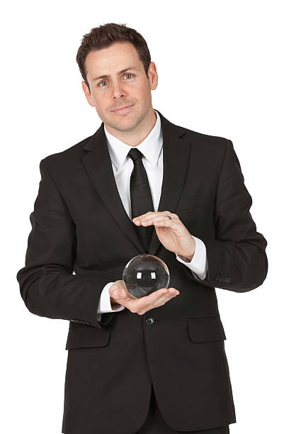 istock Businessman holding a crystal ball 184941312