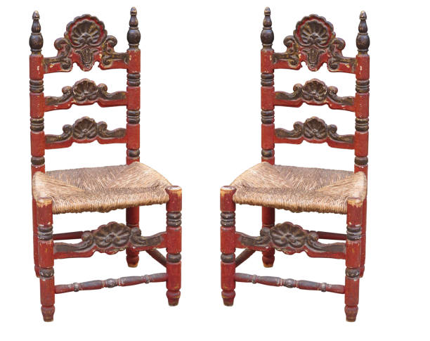 istock Old medieval wooden chair isolated on white 1849418675