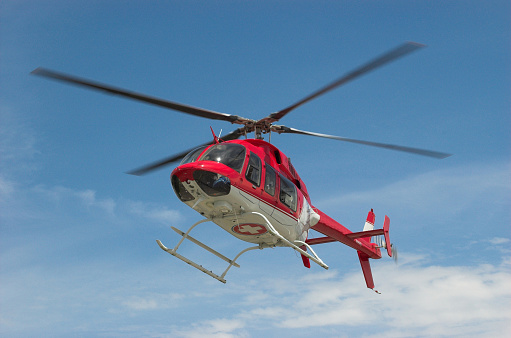 Small helicopter in flight. Helicopter for two people concept