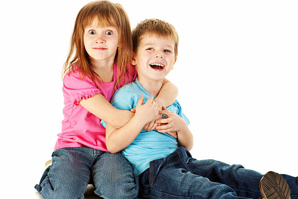 istock Brother and sister playing 184942421
