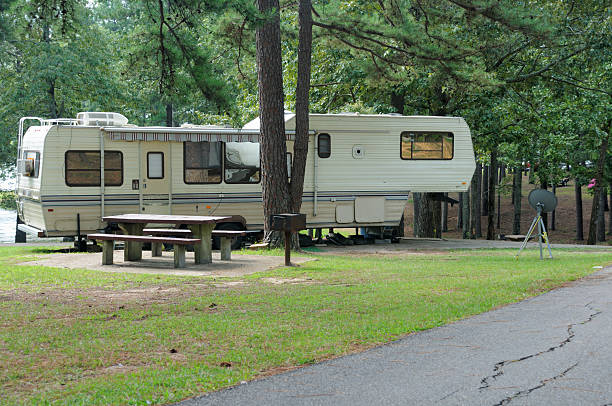 istock Fifth wheel RV in campground 184942496