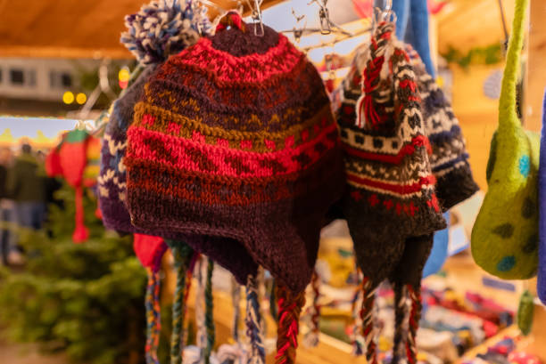 istock Multicoloured two winter knitted hats on sale 1849426143