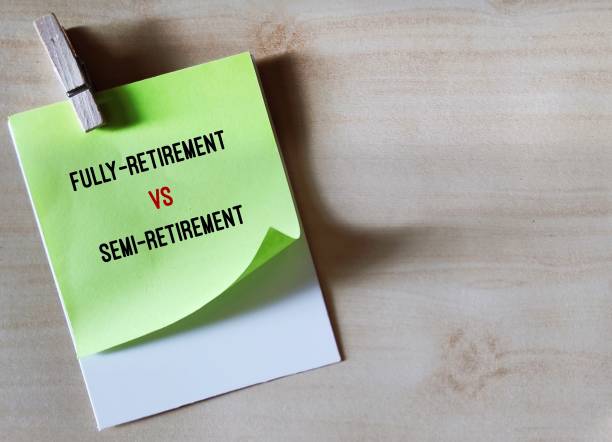 istock On copy space wood background, paper with text SEMI-RETIREMENT VS FULLY-RETIREMENT, concept of modern trend when significant number of retirees plan to work part-time after they retire 1849428263