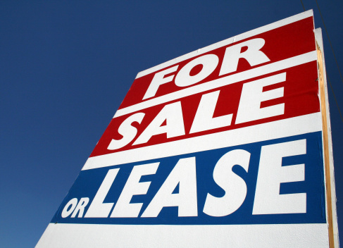 A for sale or lease sign with a blue sky backdrop.Other Real Estate photos: