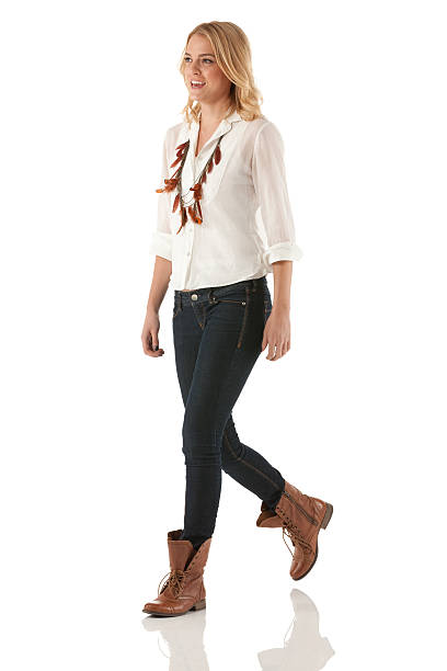 istock Happy woman walking 184943083