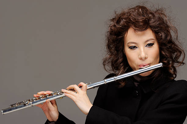istock Woman playing flute 184944081