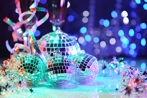 Party decoration with disco balls Party decoration with disco balls lit with colored bare flashes prom stock pictures, royalty-free photos & images