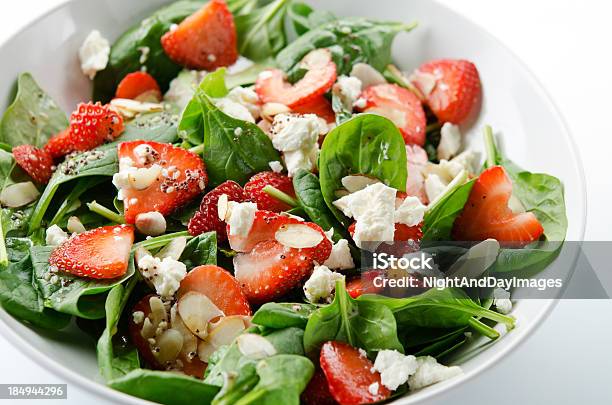 Green Salad With Strawberries And Spinach Stock Photo - Download Image Now - Salad, Strawberry, Spinach