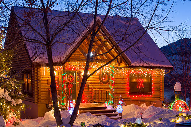 istock House with Christmas Lights at Dusk All Lit Up 184944465
