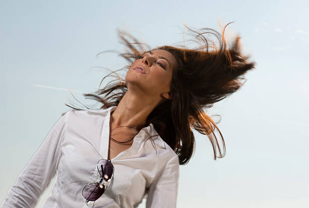 istock Woman shaking her hair 184944634