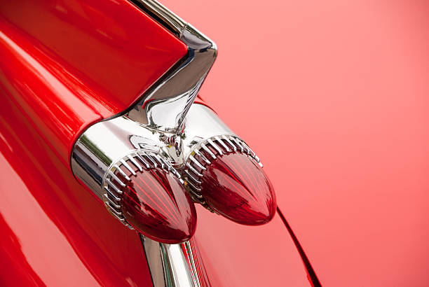 Cadillac Tail light "Cadillac Tail light vintage, 1950 Coupe de Ville red and chrome" car classic light tail stock pictures, royalty-free photos & images