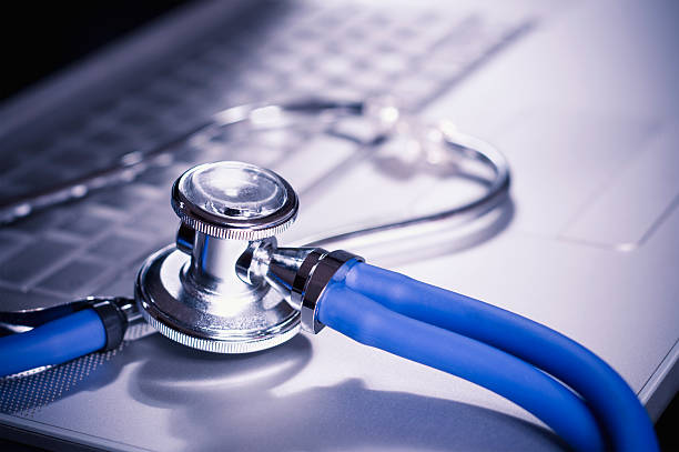 istock A stethoscope laying on a laptop 184945057