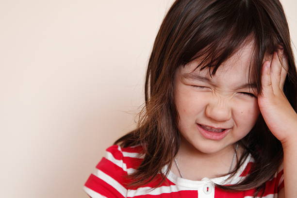 the child is crying and laughing, the child is hysterical