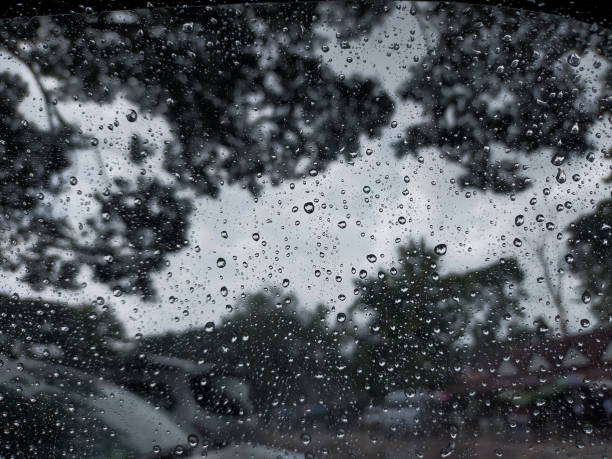istock Raindrops on the windshield of a car. 1849463126